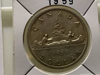Reverse of 1959 Canadian silver dollar in 2×2 flip