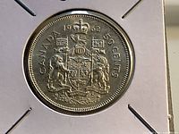 Reverse of 1962 Canadian 50-cent coin featuring coat of arms