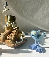 Overall view showing Peppin sea gull sculpture and bluebird figure