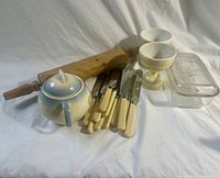 Full lot showing sugar bowl, rolling pin, eight knives, two egg cups and glass butter dish