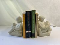 Bookends in use holding books, front view