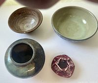 Top view of four pottery items
