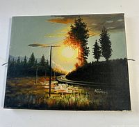 Front view of entire signed landscape painting on canvas