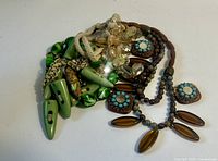 Overall view of the three necklaces grouped together