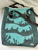 Front view of Dogo tote showing graphic design and strap