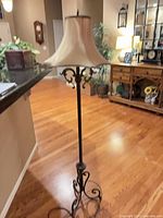 Full view of floor lamp with shade