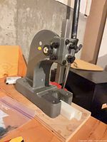 Oblique view of arbor press showing overall structure and base