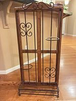 Front view of wood and iron wine rack