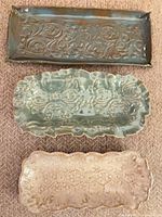 All three trays grouped to show variety, color, and condition