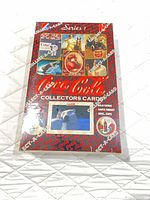 Front of sealed 1993 Coca-Cola Series 1 Collectors Cards box showing artwork, Series 1 designation and special insert callouts