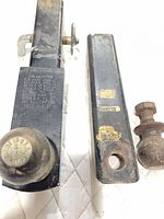 Two ball mounts and separate hitch ball overall view