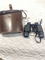 Binoculars and leather case overview