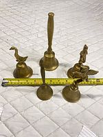 Group shot of all five brass bells