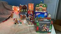 Overview of village buildings, angel topper, miniature figures, fox ornament
