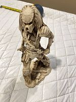 Full view of Predator figurine
