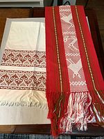 Both table runners side by side showing full length, colors, patterns and fringe