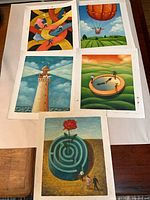 Group shot of five oil paintings on paper