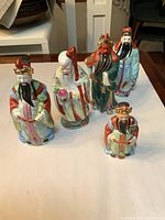 All five porcelain gods grouped