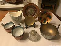 group shot displaying all eight items from front