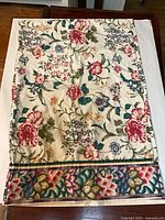 Full view of one Croscill pillow sham showing floral pattern and border