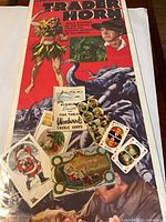 Full view Trader Horn movie poster with ephemera pieces on top