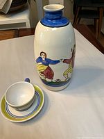 Vase, teacup and saucer full view