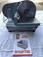 Front view of Gourmia meat slicer assembled on table
