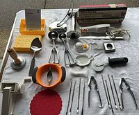 Overhead view of all kitchen gadgets laid out on table