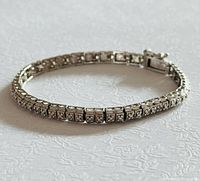 Full view of sterling 925 bracelet laid flat showing links and clasp