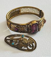 Bracelet and brooch front view