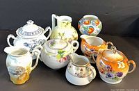 Group shot showing all eight porcelain pieces