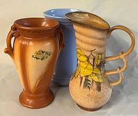 Front view of all three ceramic pieces