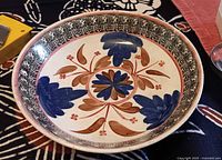 Oblique view of decorated interior showing full pattern and color