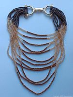 Full view of necklace showing multiple bead strands and clasp