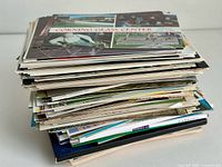 Stack of assorted postcards side view