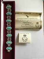 Bracelet, certificate, booklet inside presentation box