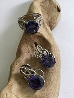 Ring and earrings frontal view displaying gemstone color and design