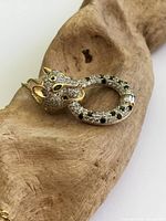 Close-up of panther pendant showing rhinestone details, hallmarked 925