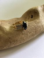 Ring front view showing marquise sapphire crystal and crystal-set shoulders