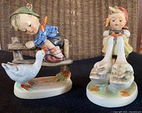 Both Hummel figurines front view