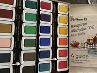 Both pull-out decks displayed with guide booklet