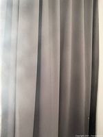 Full view of grey drape fabric