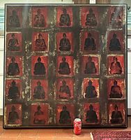 Full view of square Buddha painting with soda can for scale