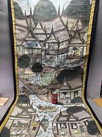 Full view of hand-painted textile with soda can for scale