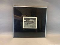 Front view of framed etching with mat and aluminum frame