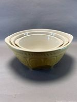 Three nested Mason Cash Cane mixing bowls