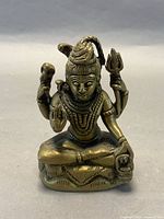 Front view of brass Lord Shiva statue