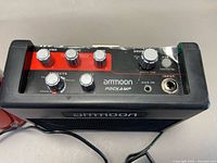 Top view showing Ammoon Rockamp control panel and branding
