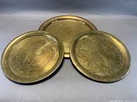 All three brass plates grouped