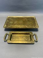 Top view of both brass trays